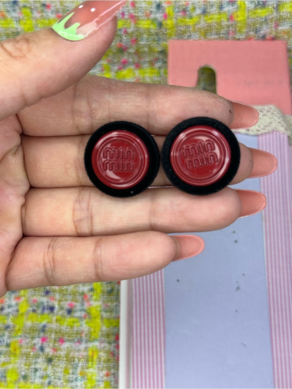 A great Black Foam Earbud Covers with Red Center Logos